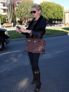 Sharon Stone seen yesterday on the streets of Beverly Hills while trying to figure out how to use her mobile phone on the 28th of January 2009