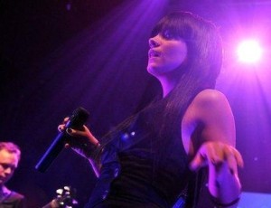 Lily Allen singing live on stage