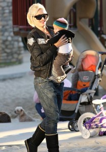 Gwen Stefani playing with baby Zuma Rossdale