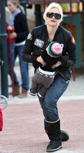 Gwen Stefani playing with baby Zuma Rossdale