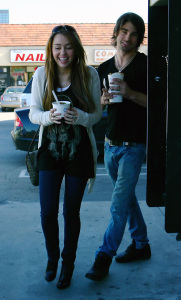 Miley Cyrus and Justin Gaston buying frozen yogurt on Jan 28th, 2009