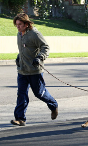 Billy Ray Cyrus walking the family dog, on January 30th, 2009