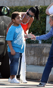 Katie Price with her son Harvey at the entrance of the Junior Blind of America School in Culver City