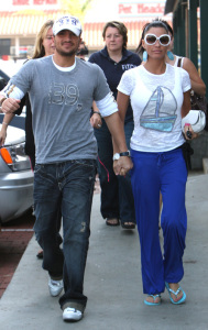 Katie Price and Peter Andre walking together at Pacific Coast Greens