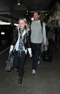 Dakota Fanning arriving at LAX Airport after being in New York City on 3rd of February 2009