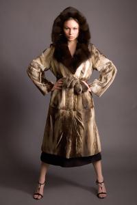 Brittany Flickinger in a long beige fur coat