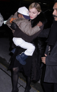 Madonna spotted carrying her son David while leaving the Kabbalah center