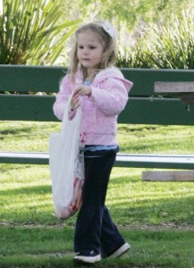 Violet Affleck playing at the park with her grandparents