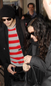 Ashton Kutcher and Demi Moore arrive at the Tegel Airport on a flight from Frankfort Germany