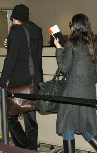 Ashton Kutcher and Demi Moore arrive at the Tegel Airport on a flight from Frankfort Germany