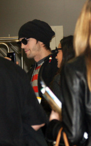 Ashton Kutcher and Demi Moore arrive at the Tegel Airport on a flight from Frankfort Germany