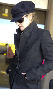 Drew Barrymore arrives at Los Angeles Airport wearing a double chest gray coat and a woolen kashmir hat on February 9th 2009 3