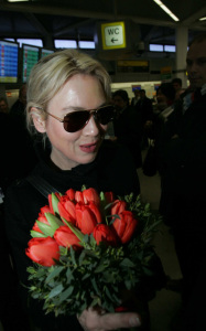 Renee Zellweger about to get on a flight from Frankfurt through the Tegel Airport on February 11th 2009 to promote her new movie My One And Only at Berlin Film Festival in Germany 2