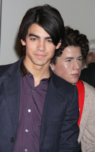 Jonas Brothers at the Madame Tussauds Wax Museum located in Times Square on February 12th 2009 to unveil their wax figures 3