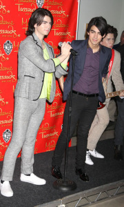 Jonas Brothers at the Madame Tussauds Wax Museum located in Times Square on February 12th 2009 to unveil their wax figures 4