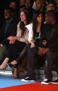 Kim Kardashian and Reggie Bush with Milla Jovovich and Kanye West