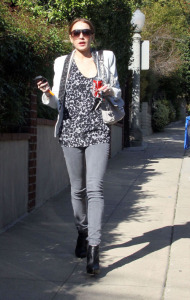 Lindsay Lohan seen walking out of Sam's home with a can of Coke in West Hollywood on February 20th 2009