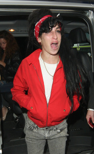 Amy Winehouse arrives in London after almost a month in the Caribbean on March 1st 2009 4