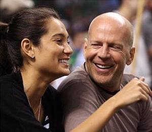 Emma Heming with Bruce Willis at the game two of the Eastern Conference Quarterfinals on April 23rd 2008 at the TD Banknorth Garden in Boston Massachusetts 2