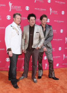 Gary LeVox, Jay DeMarcus, and Joe Don Rooney of Rascal Flatts arrive at the 44th annual Academy Of Country Music Awards