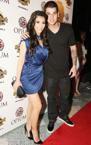 Kim Kardashian and her brother Robert Kardashian arrive at the Grand Opening party at Opium Hard Rock on April 11th 2009