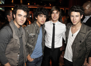 Zac Efron with the Jonas Borthers, Kevin Jonas, Joe Jonas, and Nick Jonas at the movie premiere of 17 Again on April 14, 2009