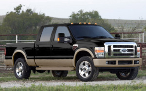 Ford f 350 2009 f 350 black and champagne 2009 Ford F 350 Super Duty XLT SuperCab 4x4 front and right side view