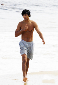 recent photos of the Brazilian young Model Jesus Luz on the beach 3