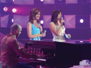 Basma singing along with Michel fadel on stage with Hilda Khalifeh standing at staracademy6 on May 8th 2009 at the LBC Star Academy 12th prime