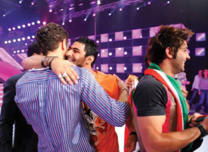 Nasser hugs Michel Azzi as he is voted off the competition at the LBC Star Academy 10th prime on April 24th 2009