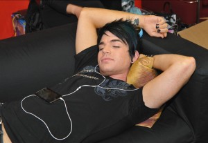 Adam Lambert wallpaper resting on the couch backstage of american idol season 8