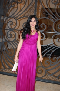 Mirhan Hussein at her birthday party wearing a stunning purple dress