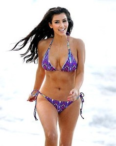 kim kardashian candids in a purple two pieces bathing suit On the beach on May 23rd 2009 5