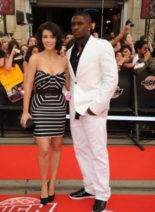 Kim Kardashian arrives on the red carpet of the Much Music Video Awards on June 21st 2009 with her boyfriend Reggie Bush 1