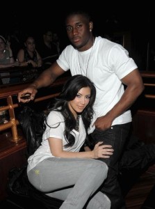 Kim Kardashian and Reggie Bush attend the AXE Instinct Power Of Leather Launch Party on June 24th 2009 14