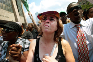 fans watching the live broadcasting of the Memorial in the Harlem neighborhood on July 7th 2009 in New York City