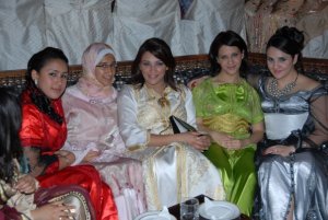 Diaa Tayyeb at her friends wedding wearing a beautiful traditional white dress