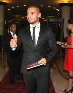 Jozeph Attyeh picture arriving at the Murex Dor 2009 awards wearing a black suit