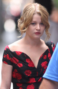 Emilie de Ravin on the filming set of her upcoming movie Remember Me wearing a black and red floral open shoulders dress 4