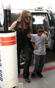 Angelina Jolie and her son Maddox minutes before their flight to Amman Jordan on July 21st 2009 to attend the 24th annual Arab Childrens Congress held by the Noor Al Hussein Foundation 2