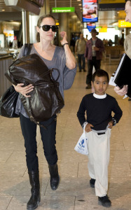 Angelina Jolie and her son Maddox spotted flying into Heathrow Airport in London on July 24th 2009 3