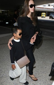 Angelina Jolie arrives at LAX airport in Los Angeles with her oldest son Maddox after a flight from London Heathrow Airport on July 24th 2009 5