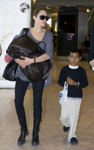 Angelina Jolie and her son Maddox spotted flying into Heathrow Airport in London on July 24th 2009 2