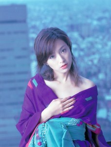 Noriko Sakai poster photos for print wearing a purple top