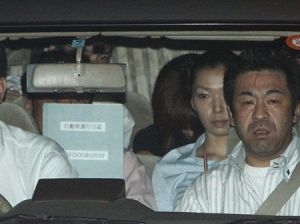 Noriko Sakai picture arriving to the police station inside the police car inTokyo on August 8th 2009 in the back seat