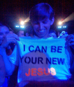 a fan with a printed tshirt that says  I can be your new Jesus during Madonnas concert yesterday in Warsaw Poland