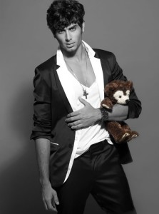 Jesus Luz photo from the most complete 2009 desktop wallpapers of the latest fashion model photoshoot holding a teddy bear