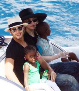 pictures of Jesus Luz with Madonna and her children Mercy and David as they had a lovely cruise on a boat in Portofino Italy on Monday August 17th 2009 8