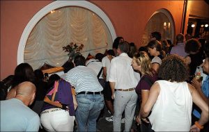 Fans of the queen of pop Madonna and her boyfriend jesus luz as they have a romantic dinner together at a resturant in Italy on August 18th 2009