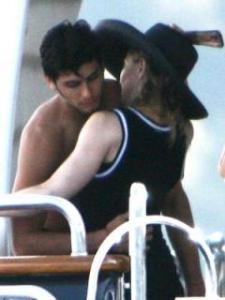 Madonna and Jesus Luz as they hug each others on a luxury Yacht in Italy on August 17th 2009